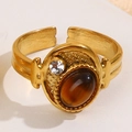 Vintage gold-finished titanium ring with oval brown natural stone and zircon accent - Brown Tiger Eye Pattern Style (A4770)