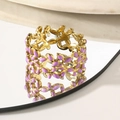 Golden镂空 ring with purple enamel leaf pattern and polished finish on mirror surface - Light Purple