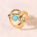 Gouden gelaagde draairing met ronde turquoise steen en klein wit zirkonia kristal - Lichtgroen (A4658)