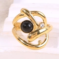 Modern gold-tone multilayer crossover ring featuring a round black gem and crystal accent - Black (A4659)