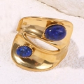 Gold-plated double-layered wide open ring with two oval blue stones on stone background - Deep Blue Sapphire Style (A4910)