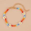 Colorful beaded daisy necklace for women with vibrant flower accents and gold lobster clasp - Rainbow Seed Bead Daisy Bracelet