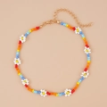 Colorful beaded flower necklace with handmade daisies and adjustable gold-tone clasp - Rainbow Seed Bead Daisy Necklace