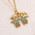 Collana placcata oro con ciondolo bambino e bambina e strass blu scintillanti - Blu