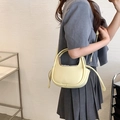 Chic cream yellow crescent handbag with drawstring liner and detachable strap - Yellow