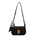 Chic black leather shoulder bag with gold CD buckle and printed silk scarf handle - Black