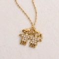 Collier en acier inoxydable doré avec pendentif garçon et fille orné de cristaux étincelants - Blanc
