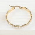 Golden wavy hoop earring with embedded pearls and spring clasp on white tray - Pearl Hoop Style (Single Piece)