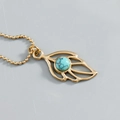 Elegante Halskette mit goldenem Blattanhänger und Türkisperle im Vintage-Stil aus Titanstahl - Blatt