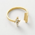 Detail view of a gold lightning ring with small pearls and adjustable open band design - Pearl Inlaid Paperclip Lightning Style