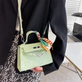 Mint green leather crossbody Kelly bag with cartoon embossing and silk scarf handle - Green