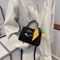 Black embossed Kelly style crossbody bag with a colorful silk scarf wrapped handle - Black