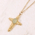 Golden cross necklace with green stone and hammered texture on white background - Light Green