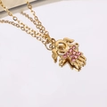 Collana con ciondolo bimba placcata oro 14K con strass rosa e catena a maglie sottili - Zirconia Rosa