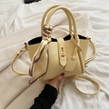 Pale yellow pebble leather bucket bag with gold lock and decorative plaid silk scarf - Yellow