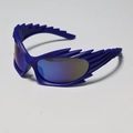 Close-up of blue Y2K wraparound sunglasses with flame-edged frames and gradient lenses - Blue Frame Blue Lenses