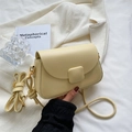 Fashionable cream yellow small crossbody bag with matte finish and dual shoulder straps - Yellow