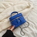 Quilted royal blue mini vanity case with chain strap and golden camellia detail - Blue