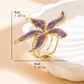 Lila Seestern Ring mit Goldrand in einer Muschelschale, Größe 4cm x 4cm Deko - Lila