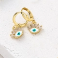 Gouden Evil Eye oorbellen met blauw emaille en fonkelende baguette zirkonia kristallen - Wit