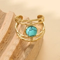 Gold hollow layered ring with hammered texture and a turquoise stone center - Turquoise