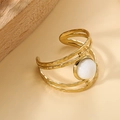 Golden hollow wide open ring with hammered texture and white gemstone inlay - White Stone