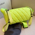 Neon green quilted nylon cylinder crossbody bag with wide shoulder strap - Yellow