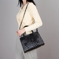 Women's black crocodile embossed handbag with crossbody strap and top handles - Black