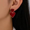 Elegantes pendientes de doble corazón con acabado rojo brillante y bordes dorados - Rojo