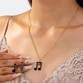 Elegantes Set aus goldener Halskette mit Musiknoten-Anhängern aus schwarzem Emaille - Musiknoten-Halsketten-Set 3-teilig / Gold