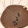 Dreiteiliges Musiknoten-Halsketten-Set mit silbernen Rahmen und schwarzen Emaille-Anhängern - Musiknoten-Halsketten-Set 3-teilig / Silber