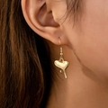 Chic golden melting heart drop earrings with a polished fluid design for women - Gold Yellow
