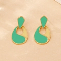 Detailed view of mint green and beige drop earrings with elegant golden metal framing - Mint Green and Beige Splicing Style / Green