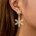 Elegant gold snowflake earrings for women, minimalist winter holiday jewelry style - Gold