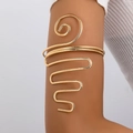 Chic gold snake arm cuff with textured diamond pattern for bohemian styling - Gold Yellow