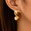 Boucles d'oreilles spirale dorées pour femmes avec une finition métallique brillante - Jaune d'Or