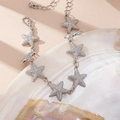 Silver starfish charm bracelet with pavé texture on a shell background for women - Silver