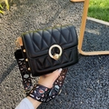 Black quilted crossbody bag with bohemian wide strap and triangular stitching details - Black Circular Lock