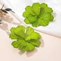 Elegant green leaf earrings featuring layered enamel design in a stylish floral shape - Green