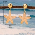 Elegant gold starfish drop earrings with pink enamel, size 4.5cm by 2.5cm, beach style - White