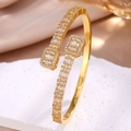 Macro detail of gold open bangle featuring geometric square ends and pavé set crystals - BP2339 Gold (Bangle)