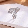 Macro detail of silver ring featuring rectangular pavé diamonds on textured stone - RP2386 Platinum (Ring)