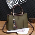 Olive green litchi grain tote bag with dark brown handles and a LOVE ribbon charm - Green