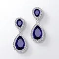 Deep blue teardrop zircon earrings set in silver with sparkling halo stones - Blue