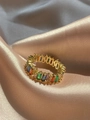 Elegant gold fashion ring featuring vibrant multi-colored baguette-cut cubic zirconia - Rainbow Zirconia Gold Band