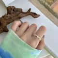 Elegant gold band ring with baguette-cut transparent gemstones in a luxury minimal style - White Zirconia 18K Gold Plated