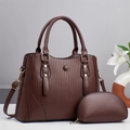 Close-up of dark brown vertical striped tote bag and matching pouch with gold hardware - 32x13x24cm / Coffee