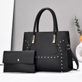 Elegante set van zwarte draagtas en clutch met gouden klinknagels en schouderband - Zwart