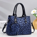 Blue leopard print tote bag in textured faux leather with round coin purse and dual handles - Blue