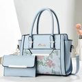 Set borsa ricamata azzurra con motivi floreali e portafoglio coordinato - Celeste